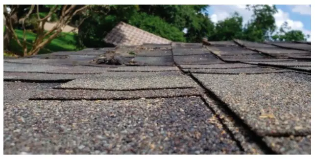 shingles storm damage by wind
